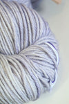 Madelinetosh Tosh DK yarn in Moonstone, soft and vibrant wool yarn for knitting and crochet projects, shown in close-up.