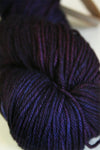 Madelinetosh Tosh DK yarn in Raspberry Cordial colorway, soft wool fiber, displayed in a skein on a neutral background.