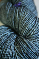 Soft Madelinetosh Tosh DK yarn in Dr Zhivago colorway, showcasing the rich, variegated wool skein with vibrant blue and green tones.