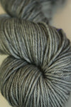 Madelinetosh Tosh DK yarn in Great Grey Owl color, soft and vibrant wool yarn close-up shot.