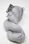Madelinetosh Tosh DK yarn in Astrid Grey, showing soft, spun wool with a smooth texture and subtle color variation.