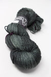 Madelinetosh Tosh DK yarn in Faded Parka colorway, showing soft, variegated knitting yarn with a smooth texture and vibrant shades.