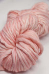 Malabrigo Rasta Merino Wool Yarn in Almond Blossom color, showing thick, soft, hand-dyed yarn for knitting or crochet projects.