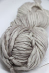 Malabrigo Rasta Merino Wool Yarn in Fog color, showing thick, soft, hand-dyed yarn with vibrant variegated shades.
