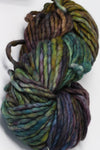 Malabrigo Rasta Merino Wool Yarn in Arequita color, showing thick, soft variegated yarn for knitting or crochet projects.