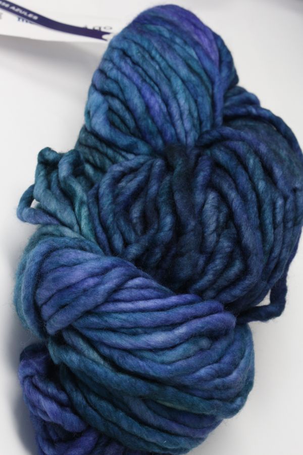 Bright blue Malabrigo Rasta merino wool yarn ball with soft, chunky texture, perfect for knitting or crochet projects.