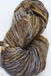 Malabrigo Rasta merino wool yarn in dark black color, showcasing thick, soft, hand-dyed yarn with a textured appearance.