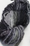 Malabrigo Rasta Merino Wool Yarn in Plomo color, showcasing thick, soft, hand-dyed yarn perfect for cozy knitting projects.