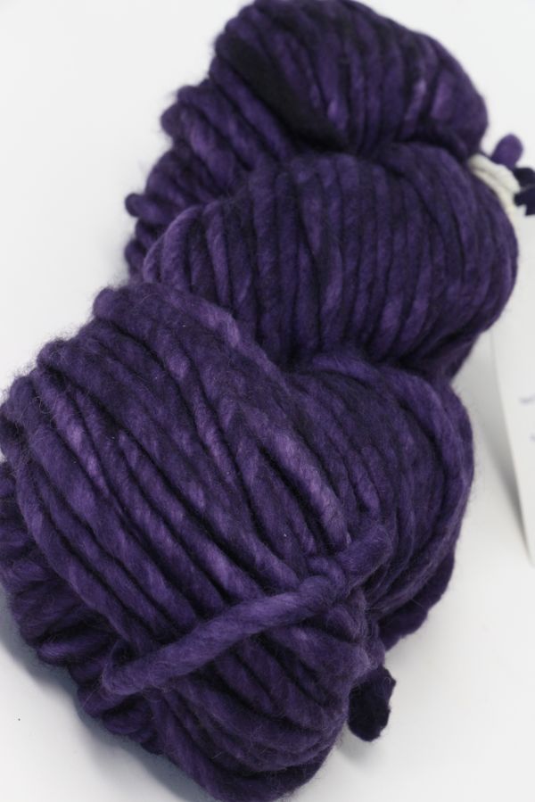Violet Malabrigo Rasta merino wool yarn ball showcasing thick, soft, hand-dyed yarn for knitting and crochet projects