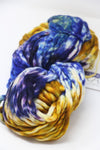 Malabrigo Rasta merino wool yarn in vibrant pensamiento colorway, showcasing thick, soft, hand-dyed wool for knitting or crochet projects.