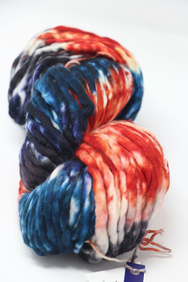 Malabrigo Rasta merino wool yarn in campfire color, showcasing thick, soft, bulky yarn for knitting and crochet projects.