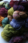 Malabrigo Silky Merino yarn in Cirrus Gray, showing soft, smooth wool fiber ideal for knitting or crochet projects.