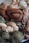 Pakucho Organic Worsted Cotton Yarn in natural beige, showcasing soft, high-quality organic cotton fibers for knitting or crocheting.