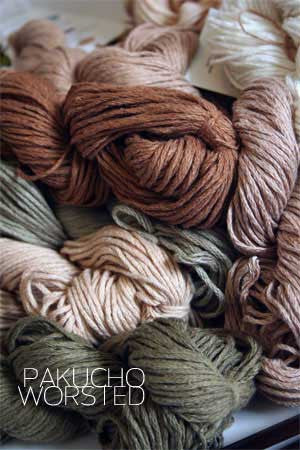 Pakucho Organic Worsted Cotton Yarn in natural beige, showcasing soft, high-quality organic cotton fibers for knitting or crocheting.