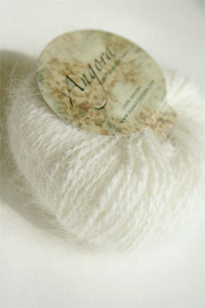 Plymouth Angora Yarn in natural color, soft and fluffy knitting yarn made from angora wool, perfect for cozy sweaters and accessories.