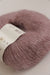Close-up of Rowan Kidsilk Haze yarn in soft, multicolored strands, showcasing its lightweight, delicate texture for knitting or crochet projects.