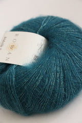 Rowan Kidsilk Haze yarn in peacock color, soft and lightweight silk and mohair blend ideal for knitting and crochet projects.