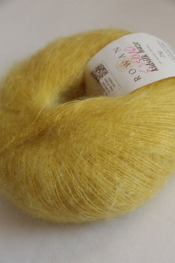 Close-up of Rowan Kidsilk Haze yarn in soft, delicate shades, showcasing its fine, lightweight texture and subtle sheen.