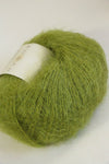 Soft, multicolored Rowan Kidsilk Haze yarn skein with a blend of pastel shades, perfect for delicate knitting projects.