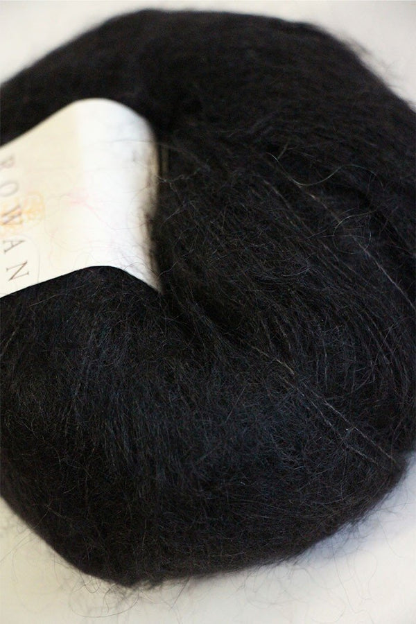 Close-up of Rowan Kidsilk Haze yarn in soft, multicolored strands, showcasing its delicate, lightweight texture.