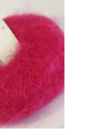 Soft, multicolored Rowan Kidsilk Haze yarn skein showcasing its delicate, fuzzy texture and vibrant pastel shades.
