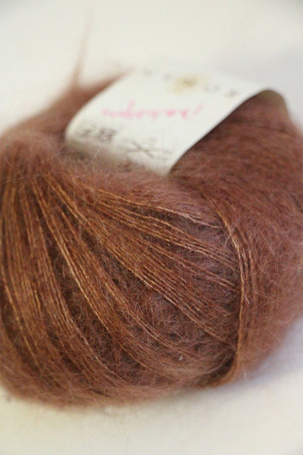 Rowan Kidsilk Haze yarn in mahogany color, soft delicate blend of silk and mohair for knitting and crochet projects