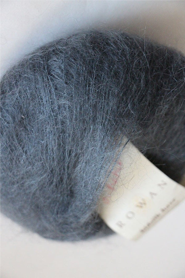Rowan Kidsilk Haze yarn in anthracite color, soft and lightweight wool and silk blend for knitting or crochet projects.