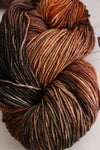 Fingering weight yarn Zen Yarn Garden Serenity 20 in soft pastel colors, showcasing textured skein for knitting or crochet projects.