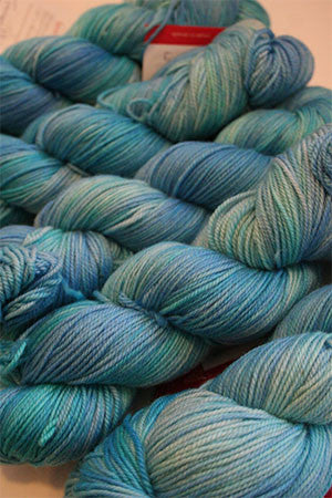Fingering weight yarn by Zen Yarn Garden, Serenity 20 in tranquil, soft pastel shades. Perfect for delicate knitting projects.
