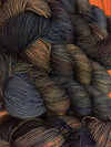 Fingering weight yarn by Zen Yarn Garden, Serenity 20 in Ocean Floor color, featuring soft blue and green tones.