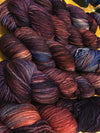 Fingering weight yarn by Zen Yarn Garden called Serenity 20 in soft, variegated shades, displayed in a yarn skein.