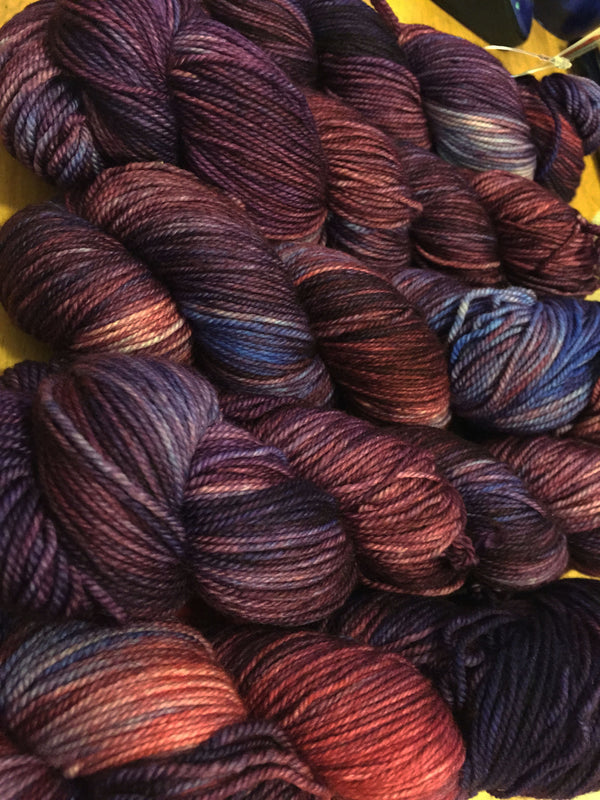 Fingering weight yarn by Zen Yarn Garden called Serenity 20 in soft, variegated shades, displayed in a yarn skein.