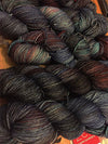 Fingering weight yarn Zen Yarn Garden Serenity 20 in Twilight colorway, showcasing soft pastel shades and fine fiber texture.