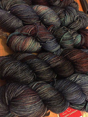 Fingering weight yarn Zen Yarn Garden Serenity 20 in Twilight colorway, showcasing soft pastel shades and fine fiber texture.