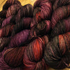Fingering weight yarn Zen Yarn Garden Serenity 20 in vibrant Vixen colorway, showcasing soft, multicolored fibers.