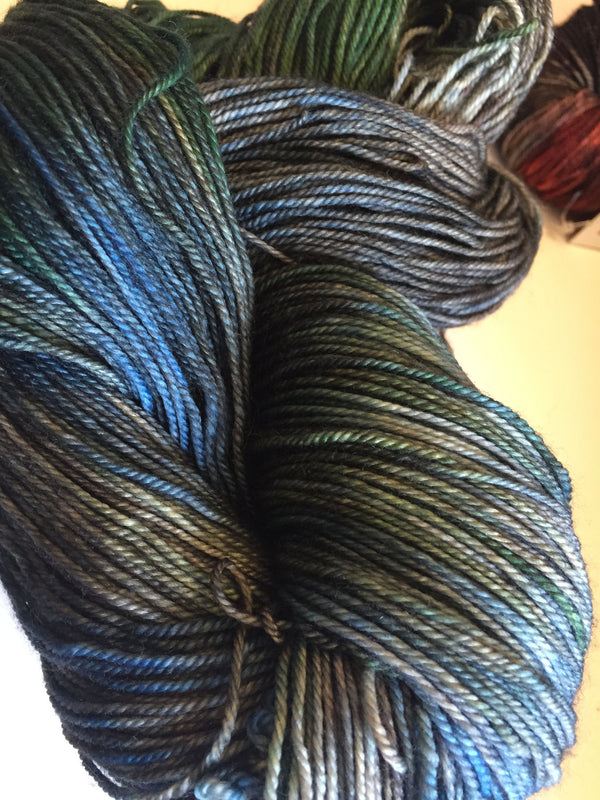 Fingering weight yarn from Zen Yarn Garden's Serenity 20 collection in a soft, speckled dish of pears colorway.