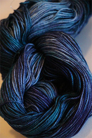 Fingering weight yarn by Zen Yarn Garden in Serenity 20 colorway, showing soft pastel shades and smooth texture.