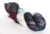 Fingering weight yarn from Zen Yarn Garden's Serenity 20 collection, showing soft, variegated yarn in subtle shades.