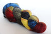 Fingering weight yarn from Zen Yarn Garden's Serenity 20 collection, showing soft, multicolored skein with vibrant hues.