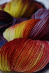 Fingering weight Serenity 20 yarn by Zen Yarn Garden, showing soft, vibrant colored yarn skein with subtle texture and gentle luster.