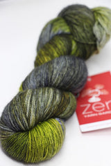Fingering weight yarn from Zen Yarn Garden's Serenity 20 collection in a moonstruck colorway, showing soft, variegated fibers.