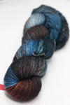 Fingering weight yarn from Zen Yarn Garden's Serenity 20 collection in a soft, variegated colorway with subtle shades.
