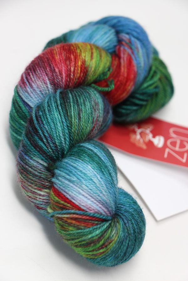 Fingering weight yarn from Zen Yarn Garden's Serenity 20 collection, in soft, variegated shades, displayed in a skein.