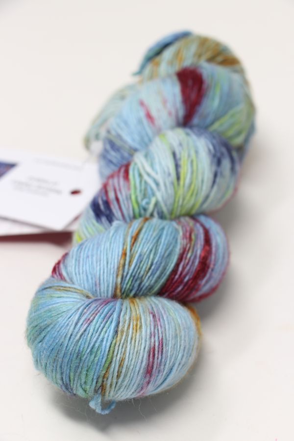 Fingering weight Zen Yarn Garden Serenity 20 yarn in soothing green and gray tones, showcasing soft, textured fiber.