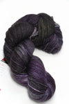 Fingering weight yarn from Zen Yarn Garden's Serenity 20 collection in rich wine cork color, showcasing soft, high-quality fibers.