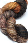 Fingering weight yarn from Zen Yarn Garden's Serenity 20 collection, featuring soft, vibrant fibers in a close-up view.