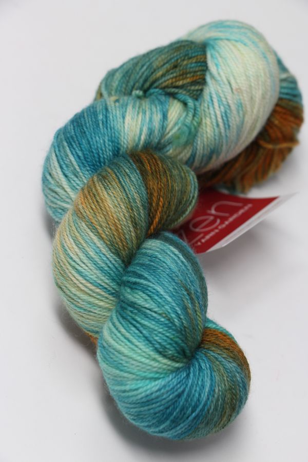 Fingering weight yarn from Zen Yarn Garden's Serenity 20 collection in Tiffany color, showcasing soft, vibrant fiber.