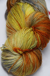 Fingering weight yarn Zen Yarn Garden Serenity 20 in Koi colorway, soft and vibrant, with subtle color variations for knitting or crochet projects.