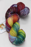 Fingering weight yarn in soft pastel colors from Zen Yarn Garden's Serenity 20 collection, displayed in a skein.