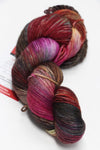 Fingering weight Serenity 20 yarn by Zen Yarn Garden in soft, natural tones, displayed in a close-up of the yarn skein.